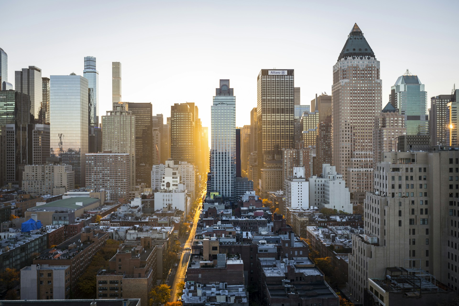 Warm evening light between city buildings